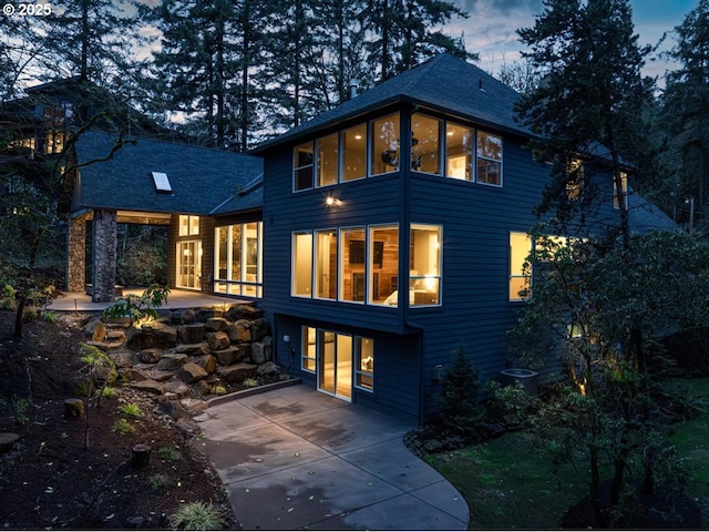 2193 NE 3rd Ave, Camas, WA 98607 - rear view of house featuring a patio area and roof with shingles