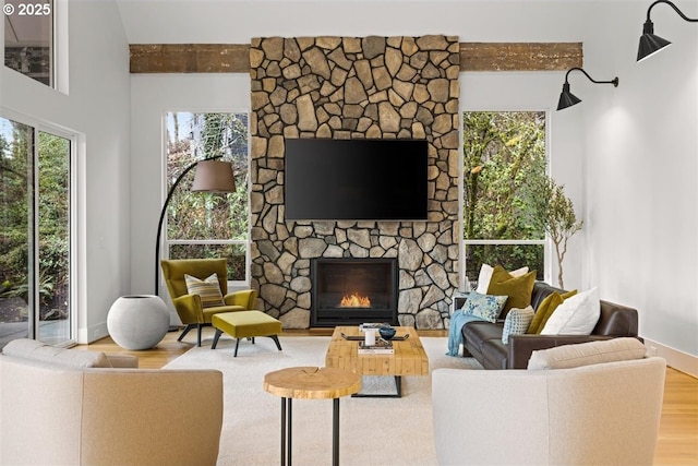 2193 NE 3rd Ave, Camas, WA 98607 - living area with wood finished floors and a stone fireplace