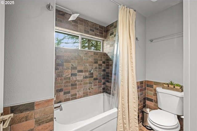 2193 NE 3rd Ave, Camas, WA 98607 - full bathroom with tile walls, shower / bathtub combination with curtain, and a wainscoted wall