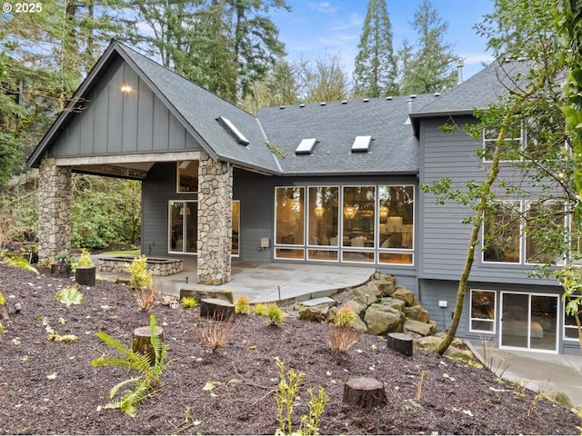 2193 NE 3rd Ave, Camas, WA 98607 - back of property featuring a patio area, roof with shingles, and board and batten siding