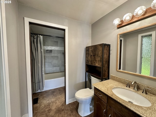 bathroom with shower / bath combo, baseboards, vanity, and toilet