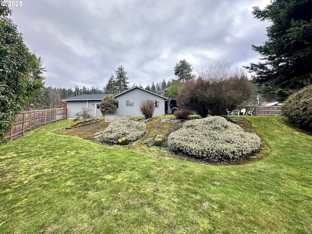 view of yard featuring fence