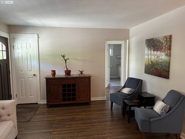 4535 SW Laurelwood Ave, Portland, OR 97225 - living area featuring dark wood-style floors and baseboards