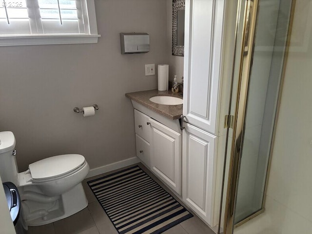 4535 SW Laurelwood Ave, Portland, OR 97225 - bathroom with vanity, tile patterned floors, and a stall shower