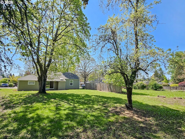 view of yard with fence