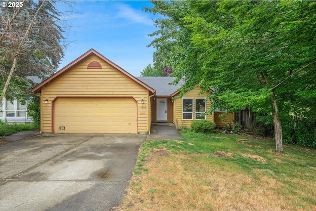 10406 NE 88th St, Vancouver, WA 98662 - view of front of home with an attached garage, asphalt driveway, and a front yard