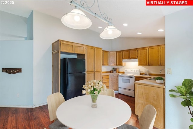 10406 NE 88th St, Vancouver, WA 98662 - kitchen featuring freestanding refrigerator, white electric stove, under cabinet range hood, light countertops, and vaulted ceiling
