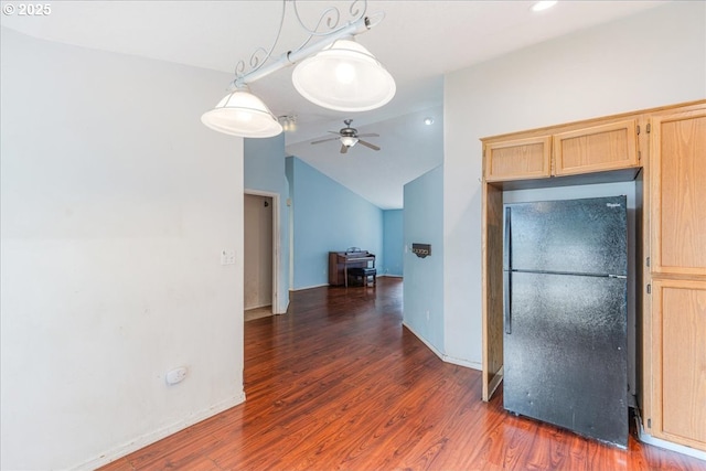 10406 NE 88th St, Vancouver, WA 98662 - kitchen with freestanding refrigerator, wood finished floors, ceiling fan, light brown cabinets, and vaulted ceiling