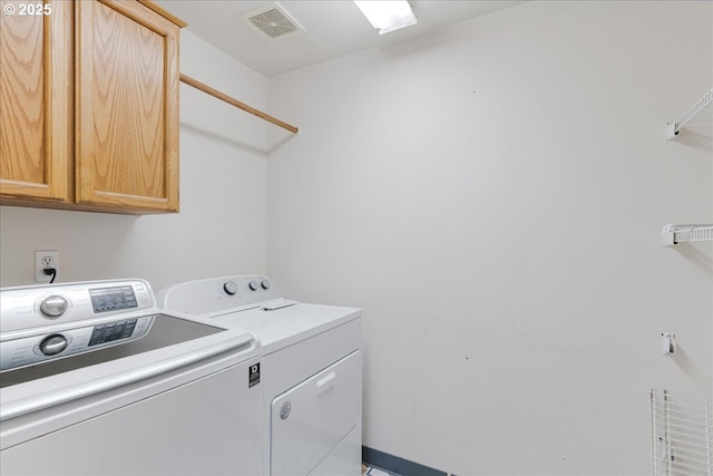 10406 NE 88th St, Vancouver, WA 98662 - laundry area with cabinet space and washer and clothes dryer