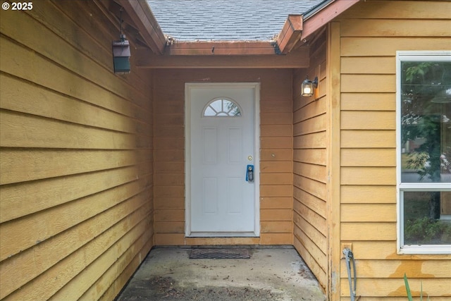 10406 NE 88th St, Vancouver, WA 98662 - view of exterior entry with a shingled roof