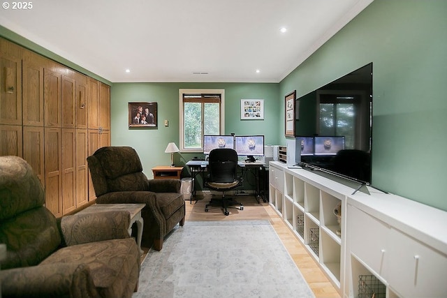 office featuring recessed lighting, light wood finished floors, and crown molding
