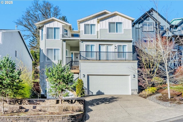 view of front facade with a balcony, driveway, board and batten siding, and an attached garage