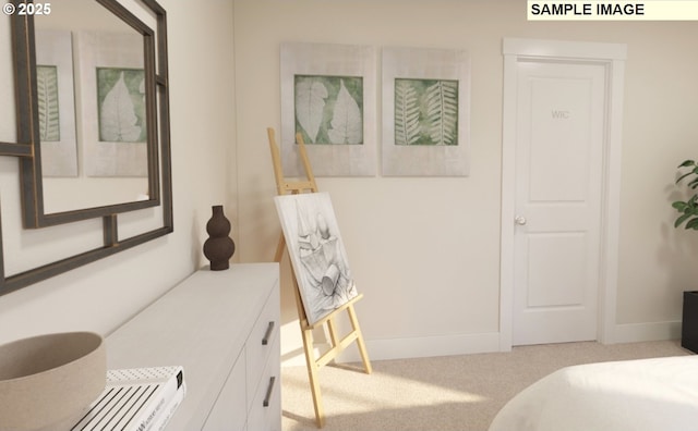 carpeted bedroom with baseboards