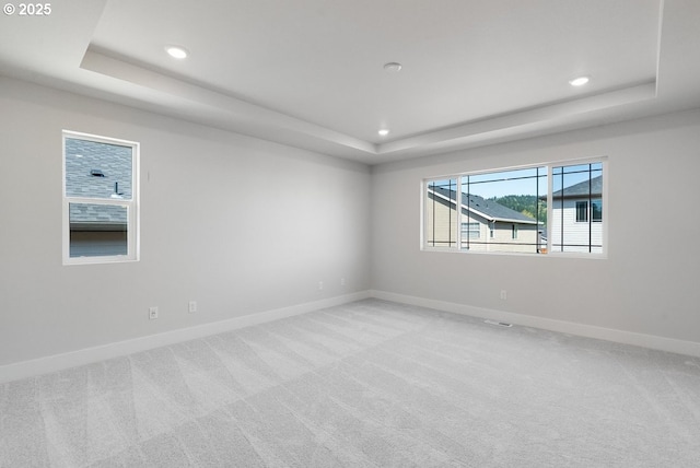 7864 NW Eleanor Ave, Portland, OR 97229 - spare room featuring light colored carpet, baseboards, recessed lighting, and a raised ceiling