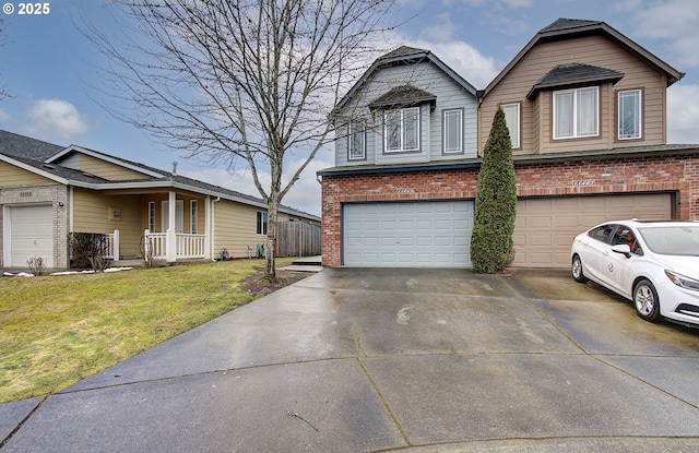 view of front of house featuring a garage and a front lawn