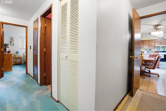 8157 Thurston Rd, Springfield, OR 97477 - hallway featuring a textured ceiling and a desk