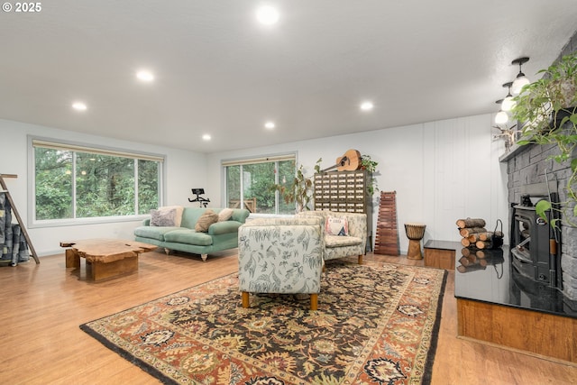 29536 Simmons Rd, Eugene, OR 97405 - living area featuring wood finished floors, a large fireplace, and recessed lighting