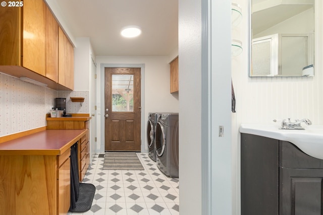 29536 Simmons Rd, Eugene, OR 97405 - washroom featuring washing machine and dryer, light flooring, and cabinet space