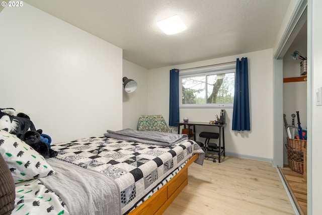 29536 Simmons Rd, Eugene, OR 97405 - bedroom with light wood-type flooring and baseboards