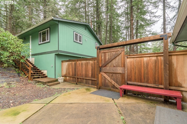 29536 Simmons Rd, Eugene, OR 97405 - view of property exterior featuring a gate and stairs