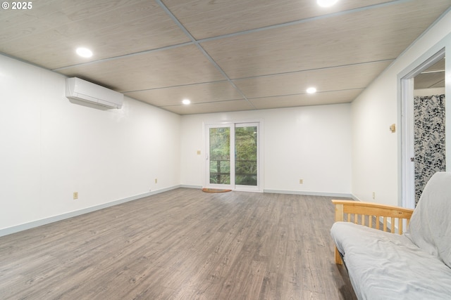 29536 Simmons Rd, Eugene, OR 97405 - unfurnished room with wood finished floors, an AC wall unit, baseboards, recessed lighting, and wood ceiling