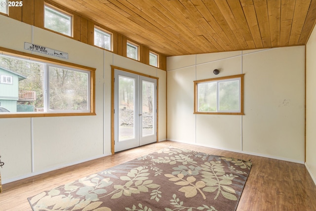 29536 Simmons Rd, Eugene, OR 97405 - doorway to outside featuring wooden ceiling, healthy amount of natural light, french doors, lofted ceiling, and wood finished floors