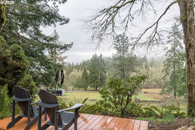 29536 Simmons Rd, Eugene, OR 97405 - wooden terrace with a wooded view and a yard