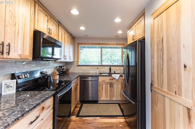 2416 SW 23rd Cir, Troutdale, OR 97060 - kitchen with black / electric stove, dishwasher, freestanding refrigerator, light brown cabinetry, and recessed lighting