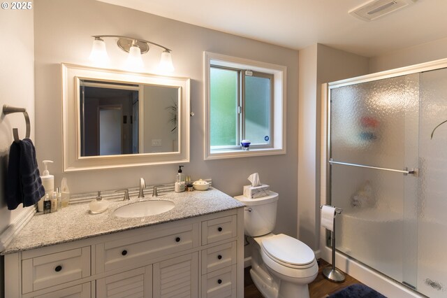 2416 SW 23rd Cir, Troutdale, OR 97060 - bathroom with vanity, a shower stall, and toilet