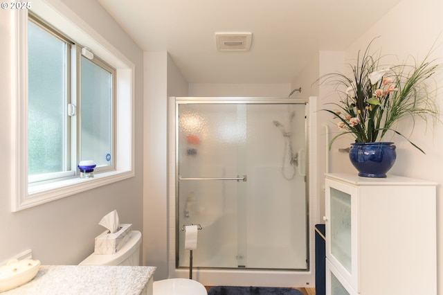 2416 SW 23rd Cir, Troutdale, OR 97060 - bathroom featuring a stall shower, vanity, and toilet