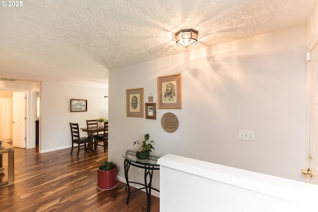 2416 SW 23rd Cir, Troutdale, OR 97060 - hall with a textured ceiling, dark wood finished floors, and baseboards