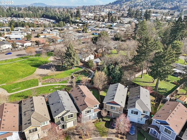 birds eye view of property with a residential view