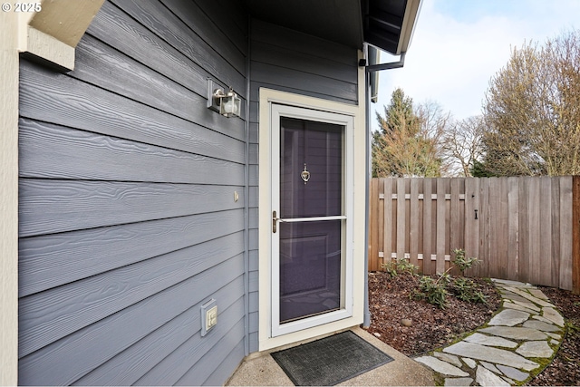 property entrance with fence