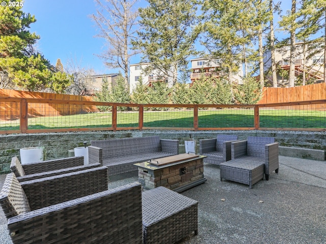 view of patio / terrace with an outdoor hangout area and a fenced backyard