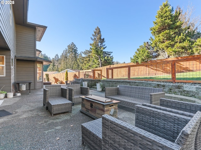 view of patio / terrace with a fenced backyard and an outdoor living space