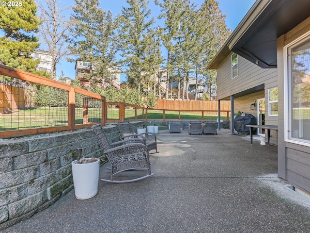 view of patio with a fenced backyard and an outdoor hangout area