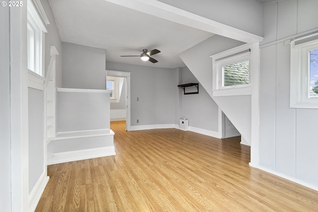 4903 SE Haig St, Portland, OR 97206 - unfurnished living room with light wood-style floors and a ceiling fan