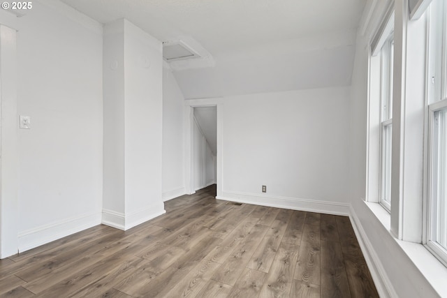 4903 SE Haig St, Portland, OR 97206 - spare room with wood finished floors, vaulted ceiling, plenty of natural light, and attic access