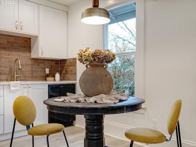 dining area with light hardwood / wood-style flooring