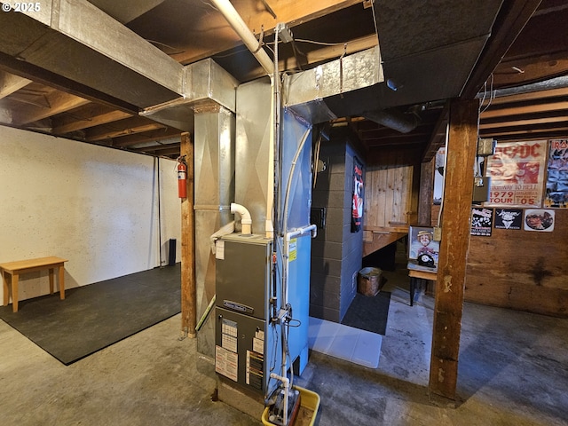 unfinished basement with heating unit