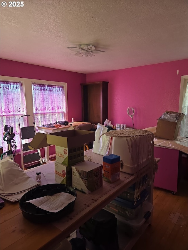 160 NW Logan Dr, Hermiston, OR 97838 - dining space featuring a textured ceiling and hardwood / wood-style floors