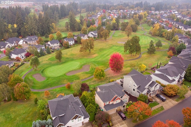 aerial view with a residential view and golf course view