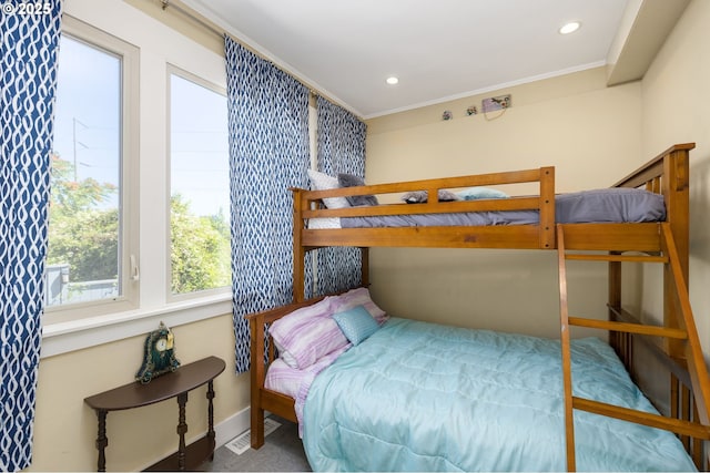 bedroom featuring ornamental molding