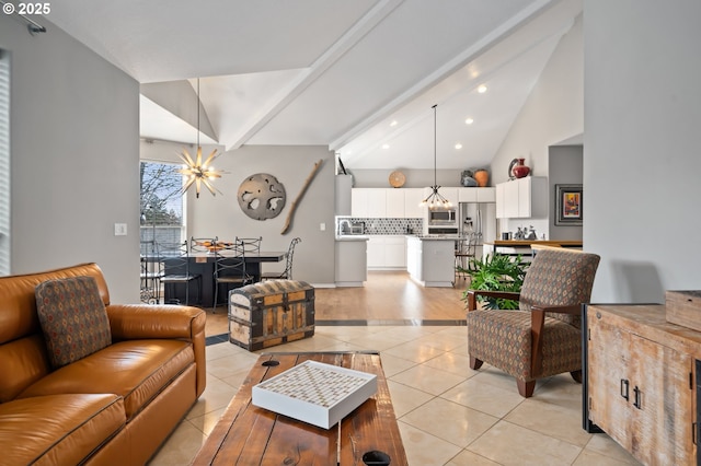 living room featuring light tile patterned floors, an inviting chandelier, and vaulted ceiling with beams