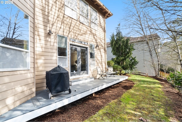 back of property with a wooden deck