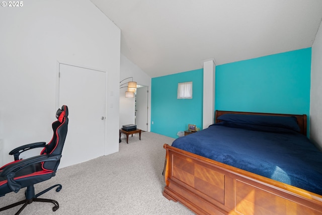 bedroom featuring carpet flooring and lofted ceiling