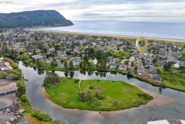 aerial view with a water view and a residential view