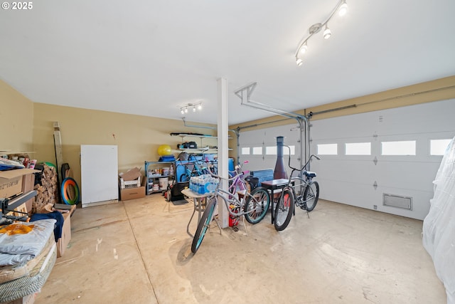 garage with freestanding refrigerator