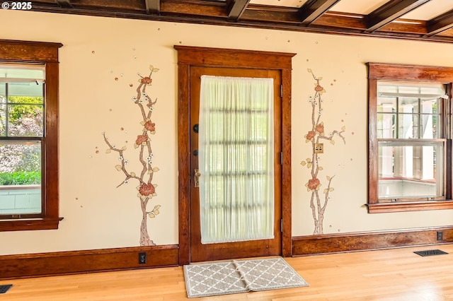 1203 SE 53rd Ave, Portland, OR 97215 - entryway featuring wood finished floors and beam ceiling