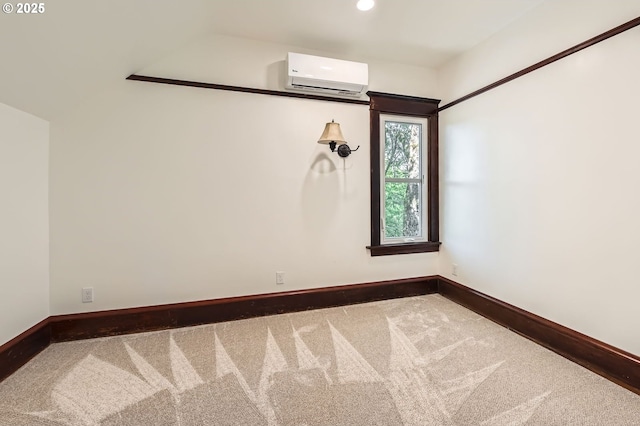 1203 SE 53rd Ave, Portland, OR 97215 - carpeted empty room with a wall unit AC and recessed lighting